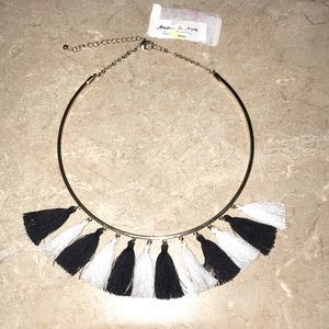 Black & white tassel necklace with gold lining